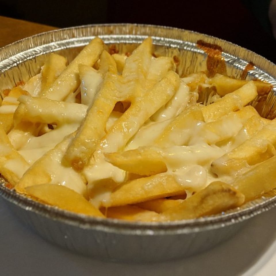 Delicious cheese fries