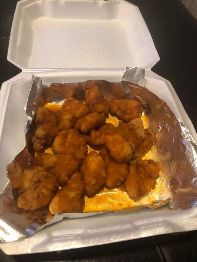 Boneless Wings with Fries.